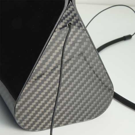 carbon fibre handbag, end panel showing 3-d effect of the twill weave