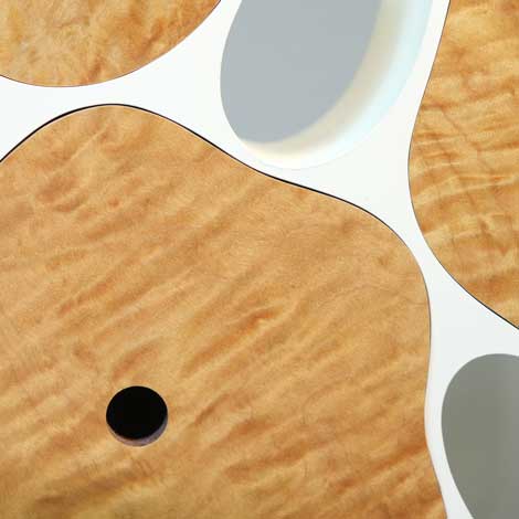 teddy leaning over back of chair