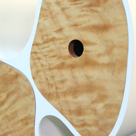 teddy leaning over back of chair