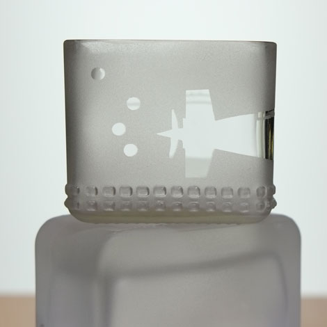 submarine leaving bubbles in it's wake. Clear glass